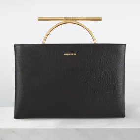 ALEXANDER MCQUEEN Cross-Bar Logo Clutch - BlackGold